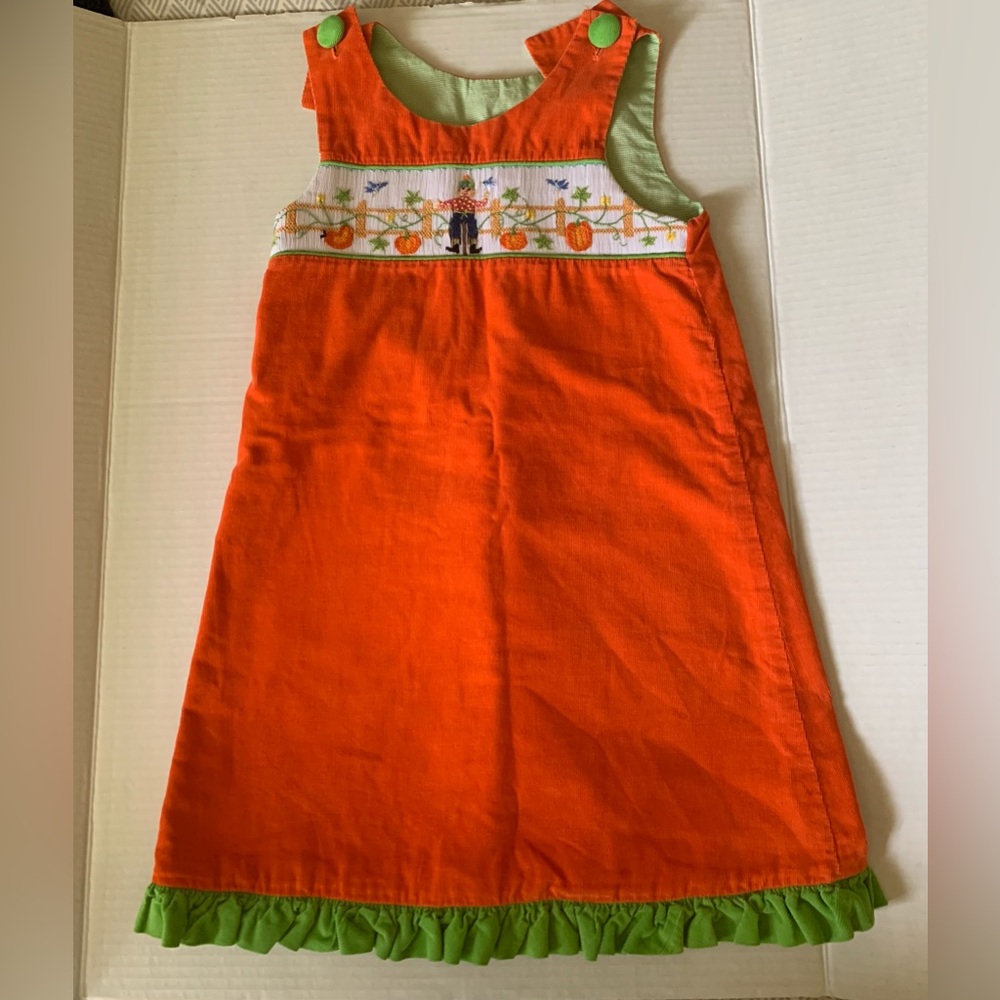Fall dress. Smocked. Orange. Corduroy material. Lined. Size 4T
